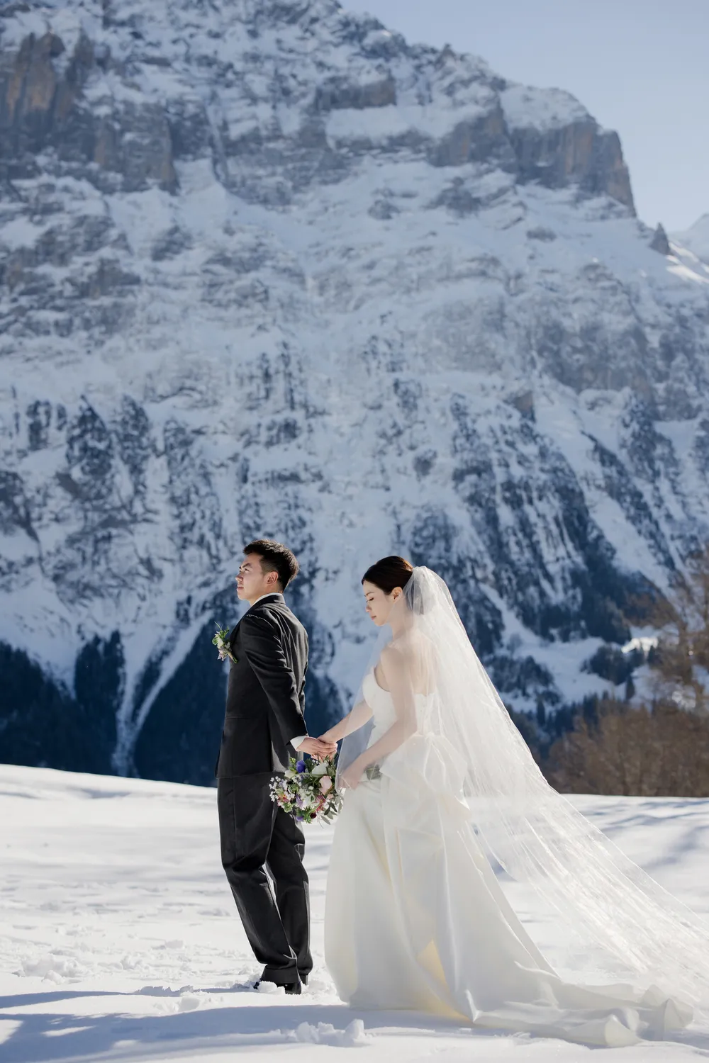 Breathtaking winter elopement ceremony in Grindelwald with the Eiger North Face
