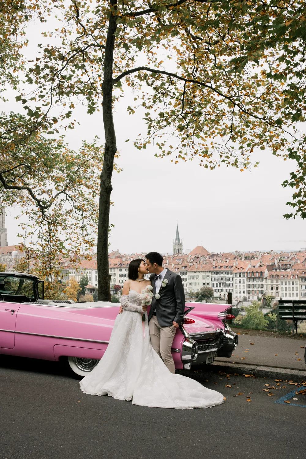 Classic vintage car and couple on the charming historic streets of Bern Switzerland