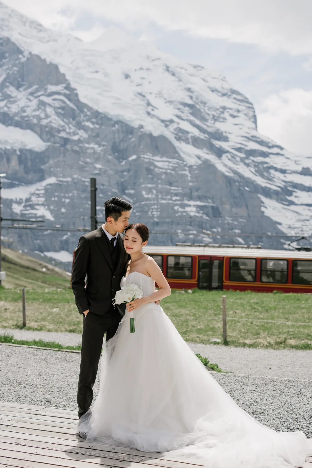 Cinematic **photography session** with the Eiger Glacier background at Kleine Scheidegg.