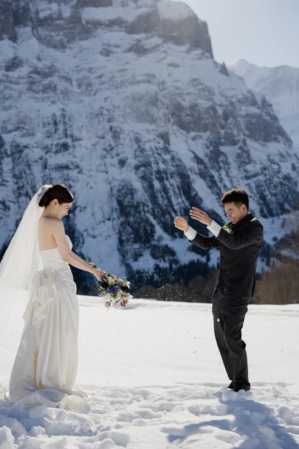 Cinematic winter wedding photography amidst the silent peaks of Grindelwald